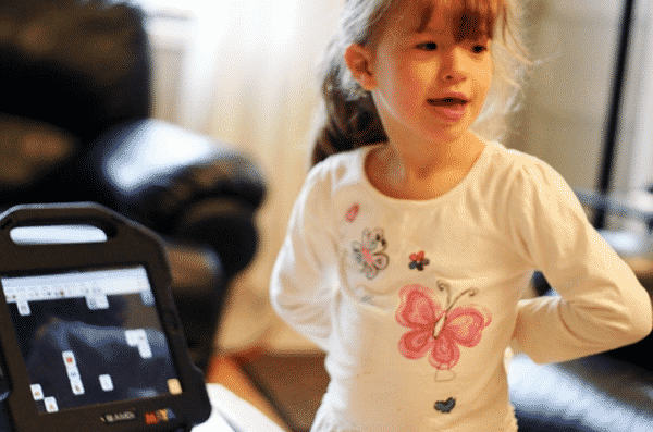 4 Year Old Girl Maya Uses SfY To Speak, Image Credit: timenerdworld.files.wordpress.com