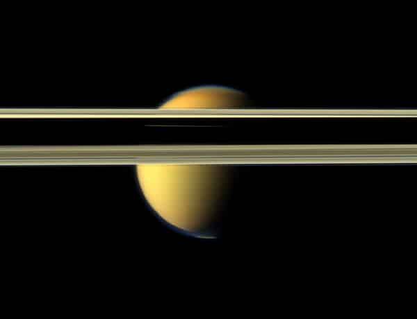 Saturn's Rings -Obscure Part Of Titan's Colorful Visage