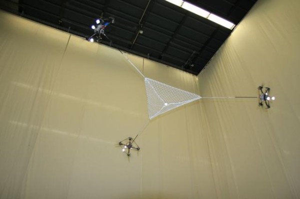 Flying Robots Playing In Air With A Ball
