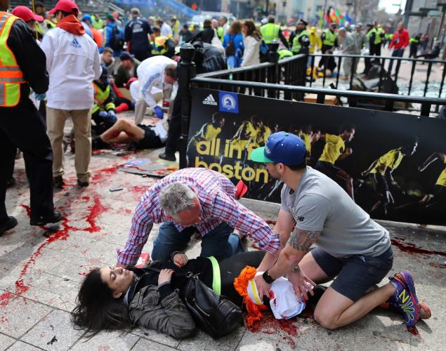 Impact Of Two Explosions At The Boston Marathon