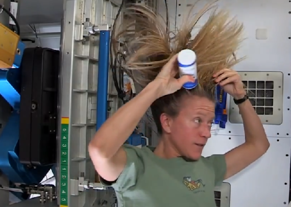 Astronaut Karen Nyberg Washing Her Hair At ISS