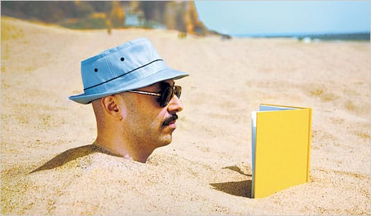Man Reading A Novel