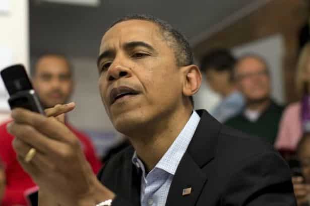 U.S. President Barack Obama With Mobile In Hand