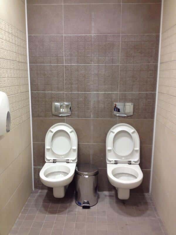 Two Commodes In One Place Without Any Divider