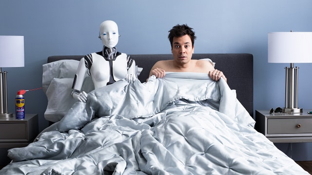 Man Sleeping With Robot