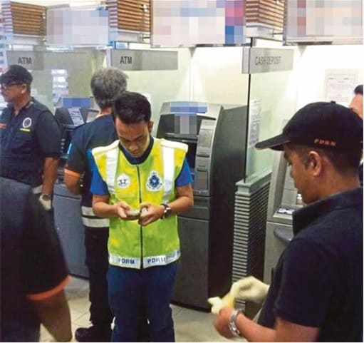 Police At Hacked ATM Machines