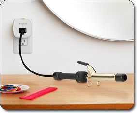 F7C009 Conserve Socket Energy Saving Outlet in a curling iron
