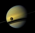 NASA’s Spacecraft Cassini Captures Colorful Photos Of Saturn And Titan