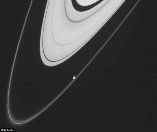 Read more about the article Cassini Probe Possibly Spots A New Moon At The Edge Of Saturn’s Ring